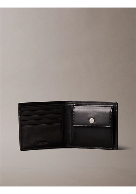 Portafoglio a libro con logo monogramma all-over e pochette portamonete CALVIN KLEIN | LV04D1085GUB1